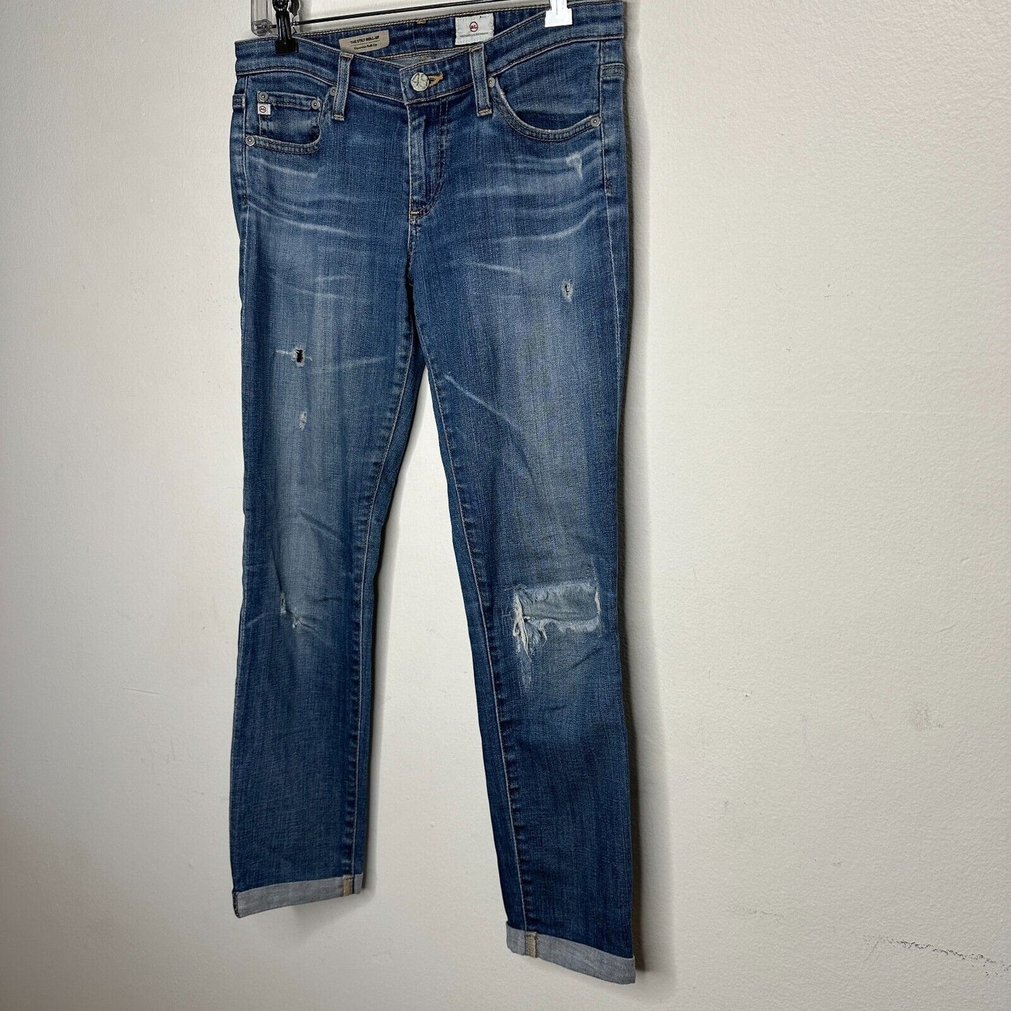 Revolve AG Flyaway The Stilt Cigarette Roll-Up Medium Wash Distressed Jean 27