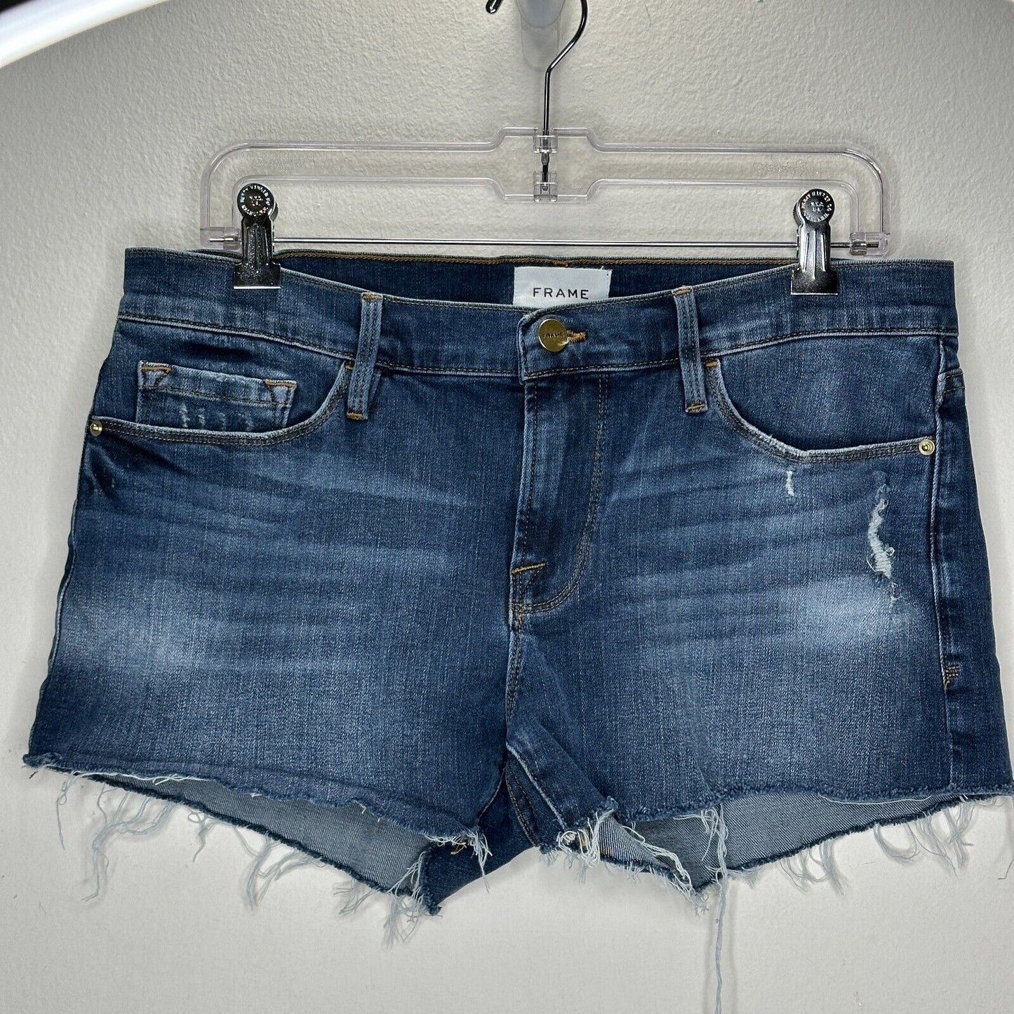 Frame Le Cutoff Medium Blue Wash Distressed Raw Hem Front Zip Jean Shorts 31