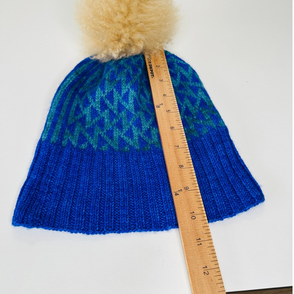 Blue Green Triangle Print Knit Beanie Tan Pom Pom OS