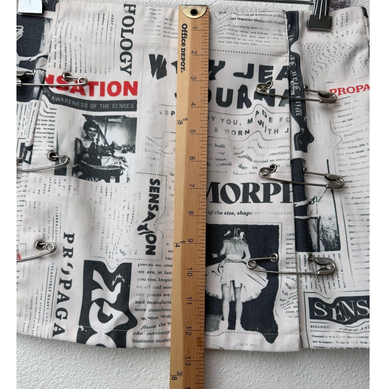 With Jéan Ivory Newspaper Print Safety Pin Mini Skirt