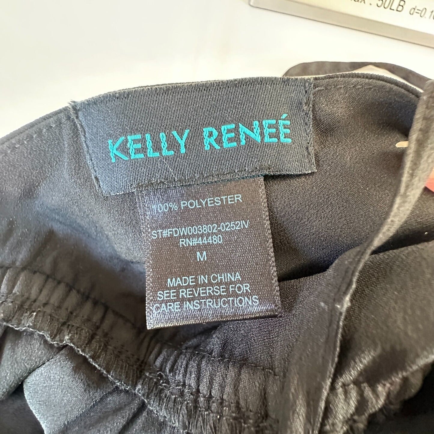 Kelly Renee Jet Black Wrap Sexy VNeck Spaghetti Halter Top Jumpsuit Romper M