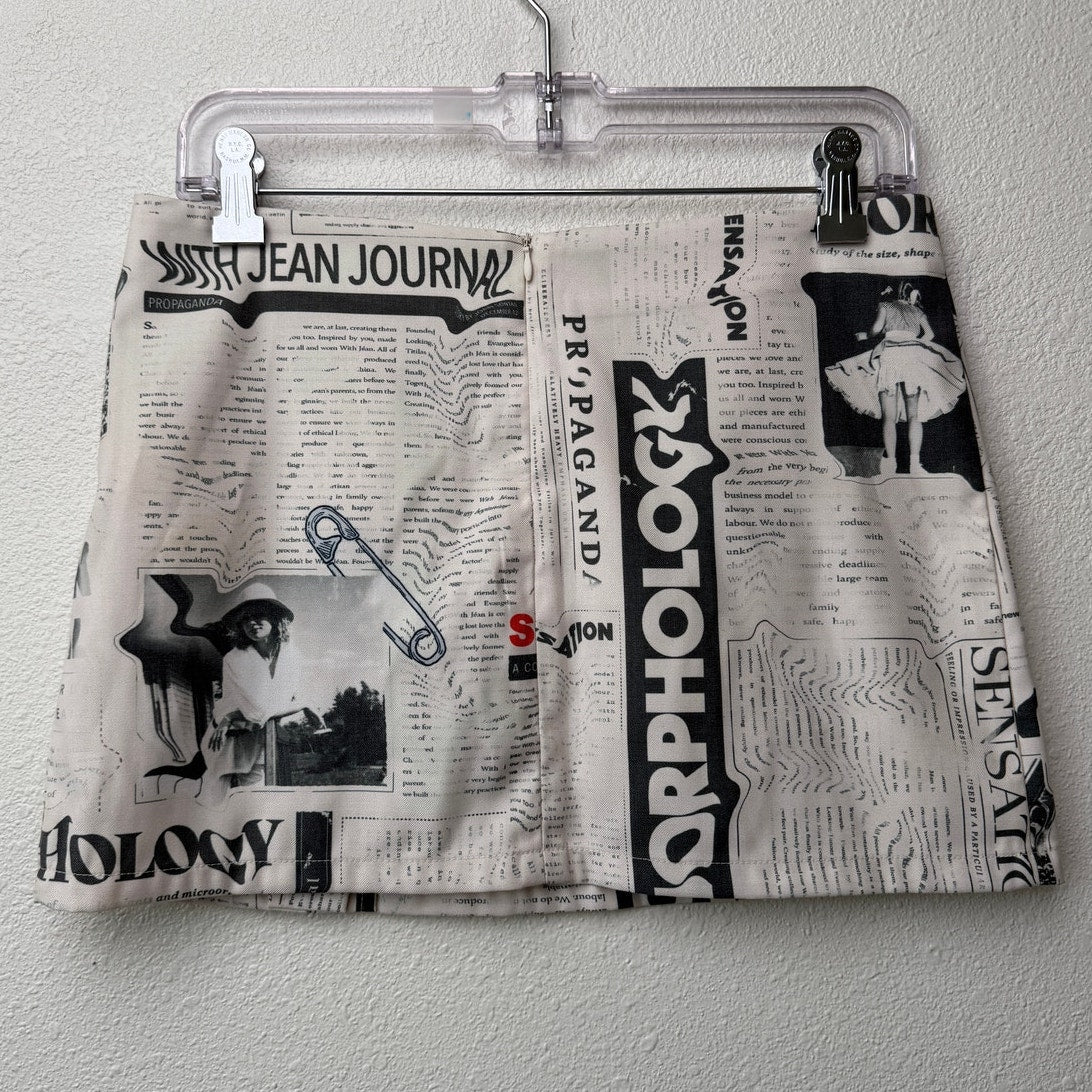 With Jéan Ivory Newspaper Print Safety Pin Mini Skirt