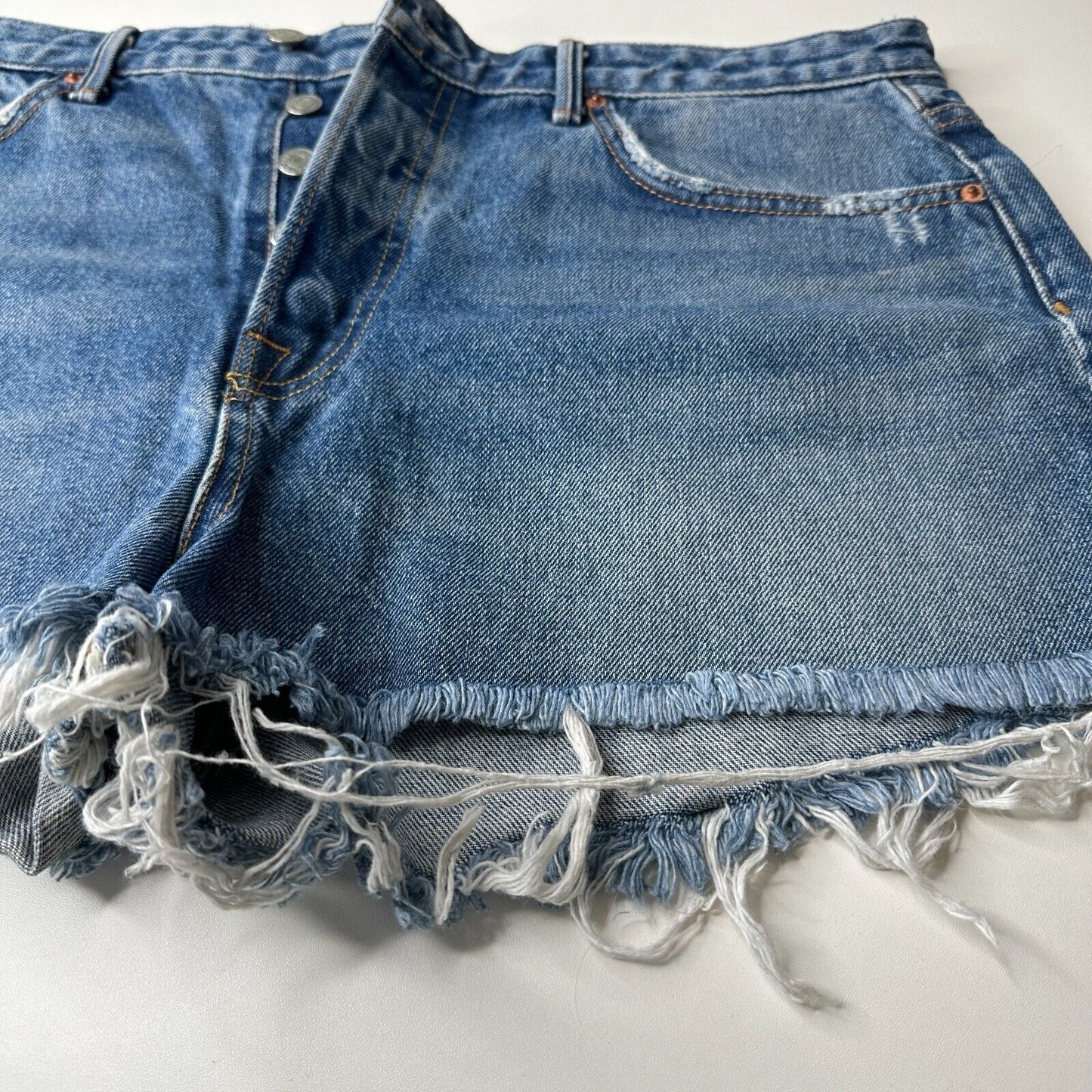 GRLFRND Cindy Button Fly High Rise Medium Blue Wash CutOff Jean Short Raw Hem 32