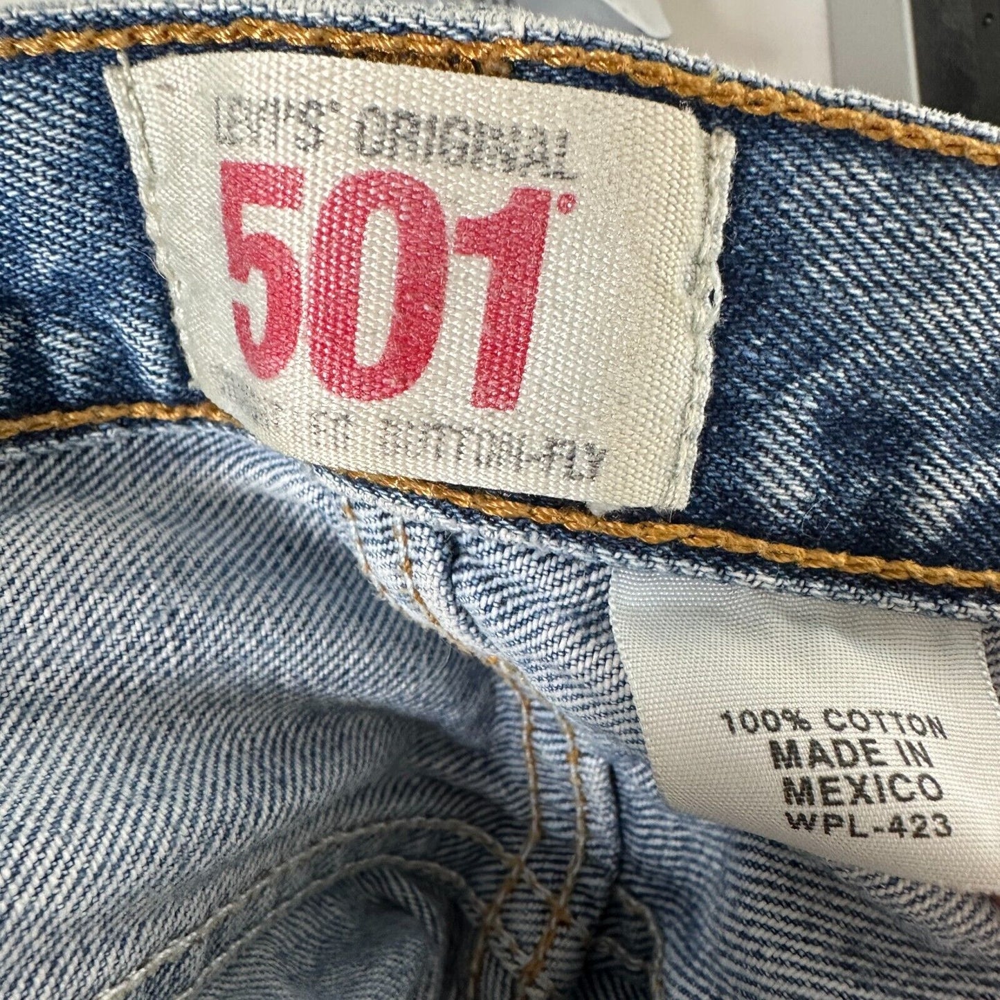 Levis 501 Medium Blue Wash Button Fly Distressed Raw Hem Shorts 34