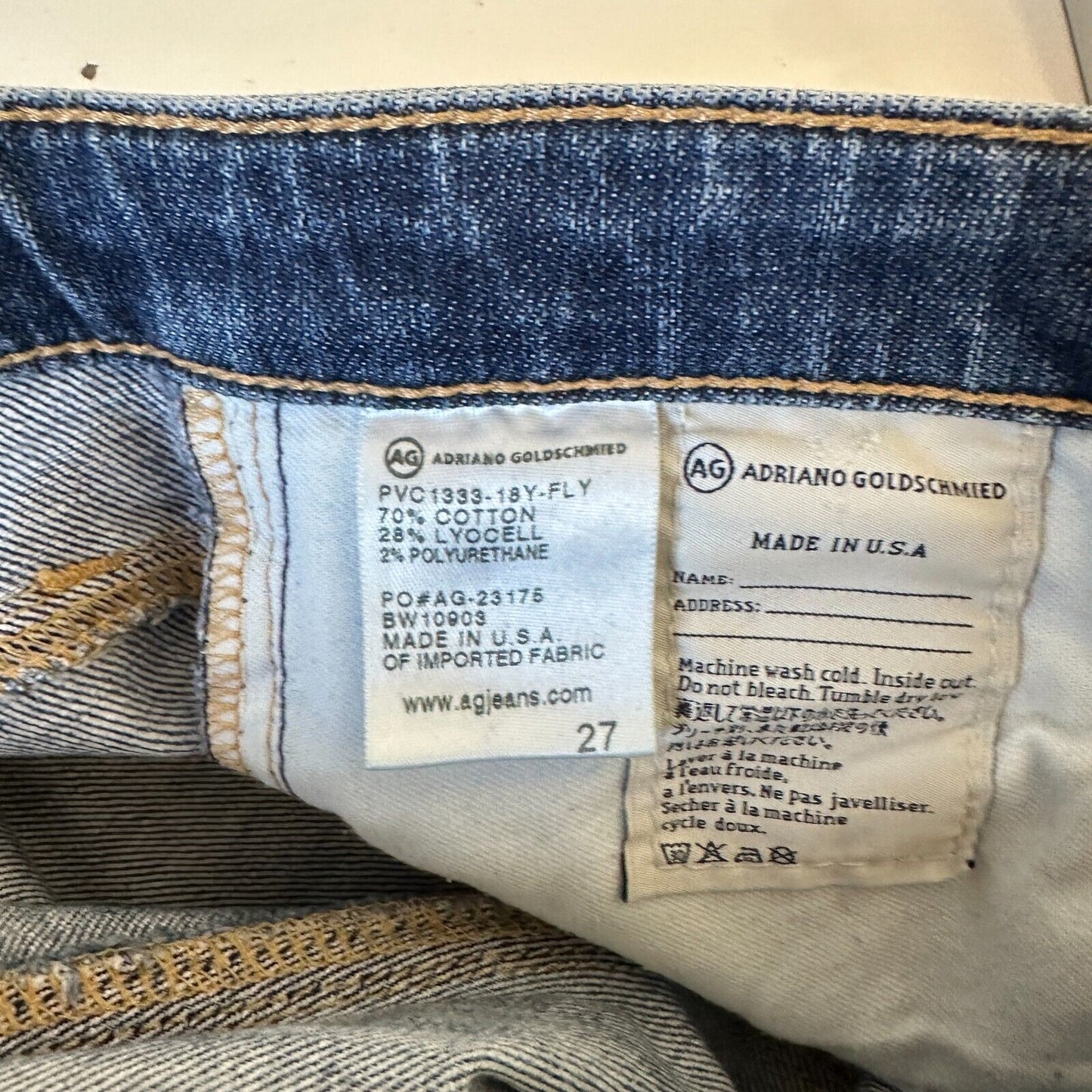 Revolve AG Flyaway The Stilt Cigarette Roll-Up Medium Wash Distressed Jean 27