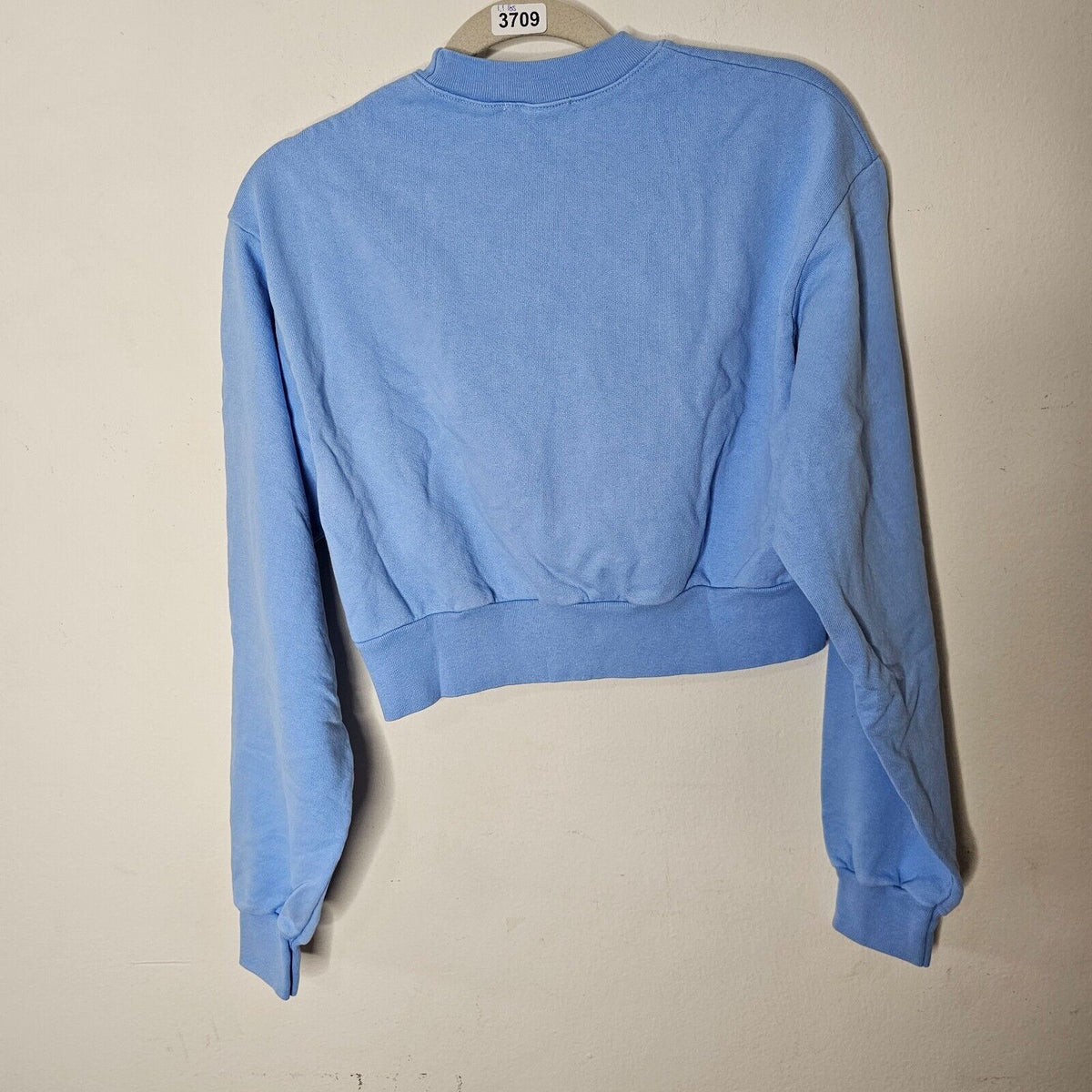 NWOT Living Cool Baby Blue Embroidered Wavy Logo Cropped Long Sleeve Sweatshirt