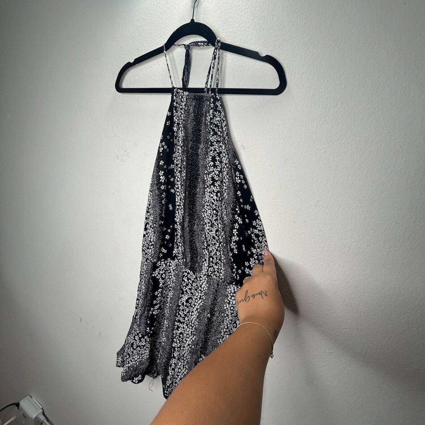 Olivaceous Black and White Floral Halter Tie Neck Open Back Flowy Romper Medium