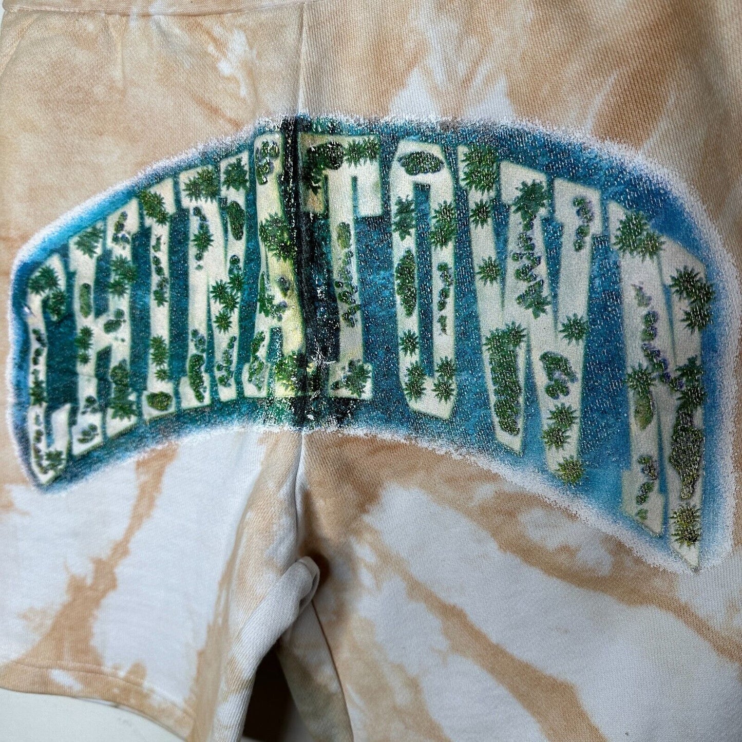 Chinatown Market Beige Tie Dye Island Arc SweatShorts Side and Back Pocket S