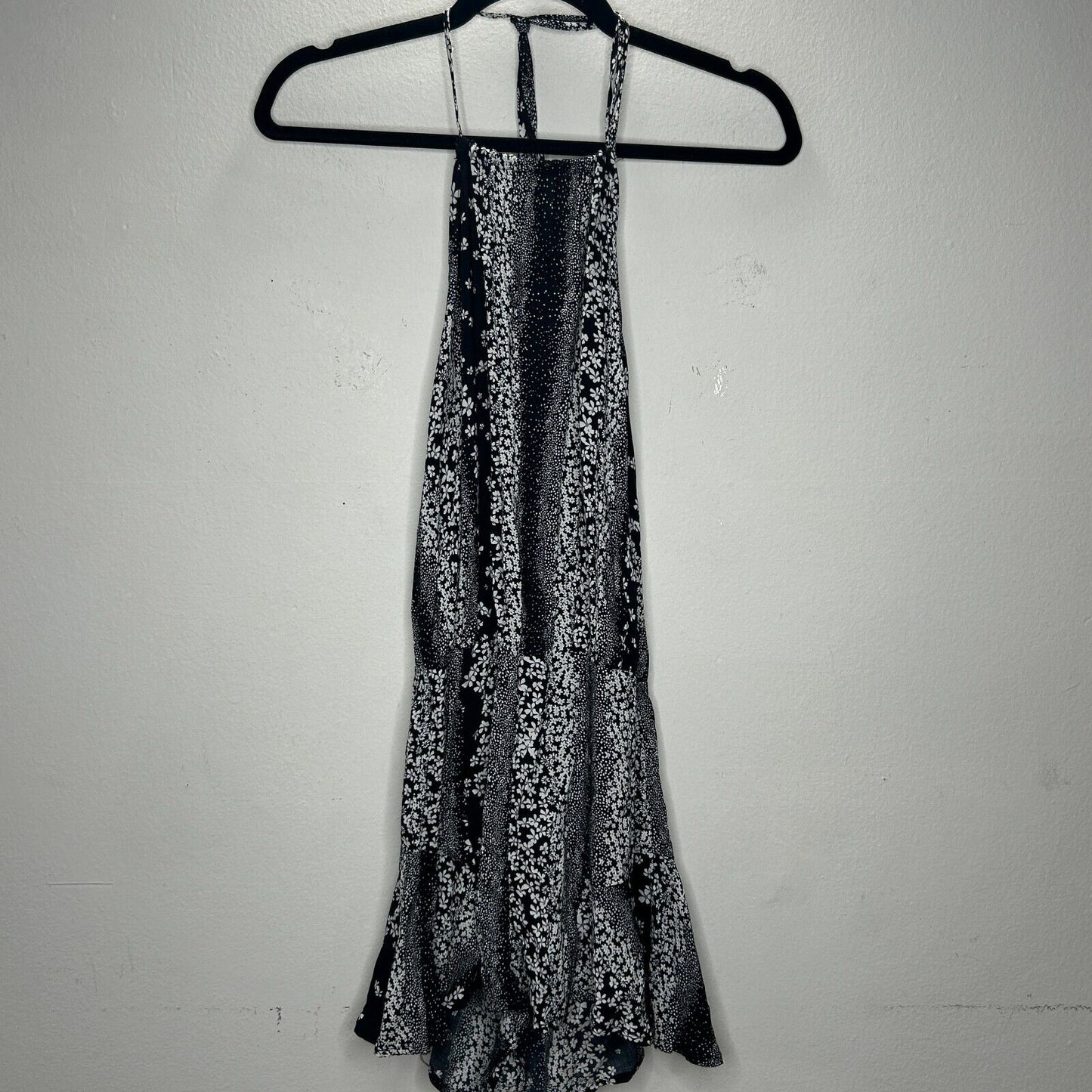 Olivaceous Black and White Floral Halter Tie Neck Open Back Flowy Romper Medium