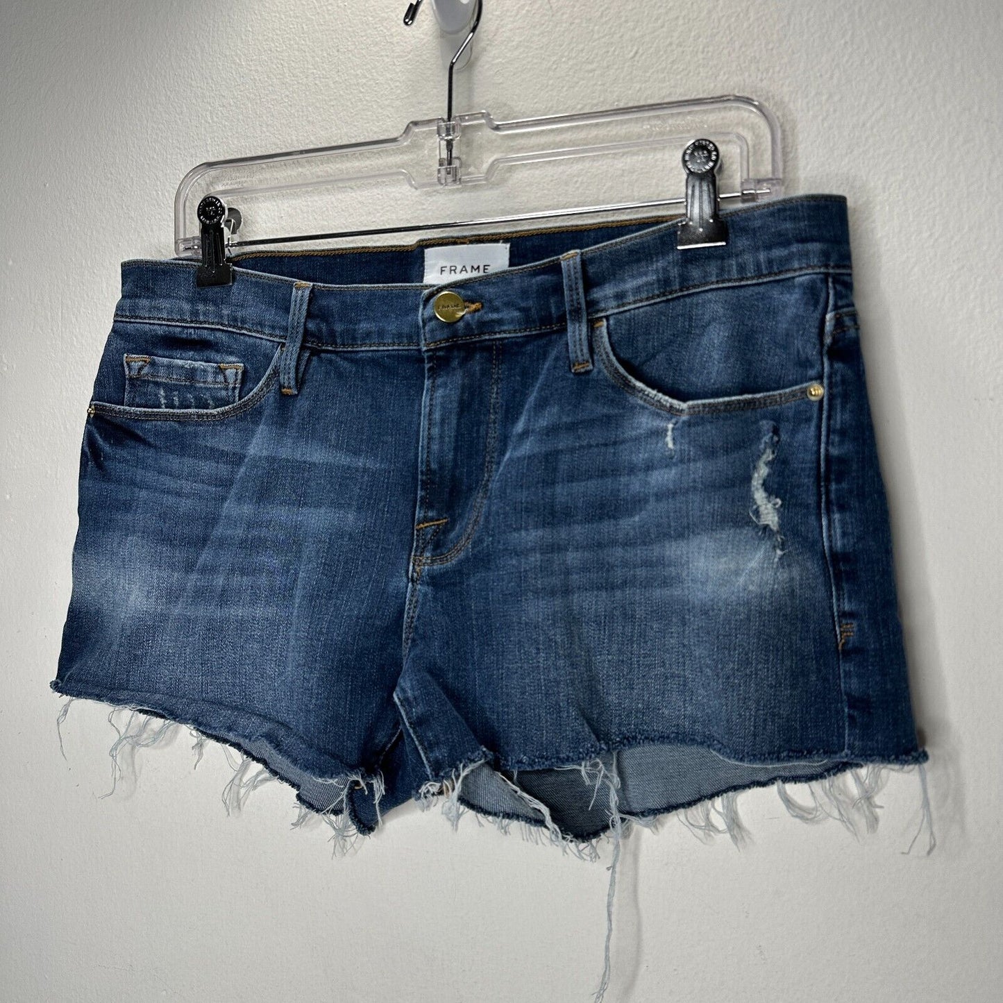 Frame Le Cutoff Medium Blue Wash Distressed Raw Hem Front Zip Jean Shorts 31