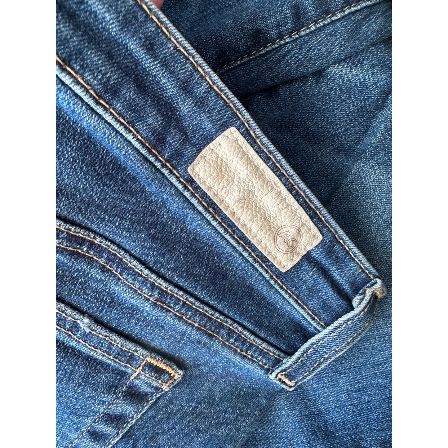 AG women’s The Stilt cigarette leg jeans medium wash US 29 raw hem